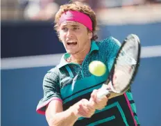  ?? AP ?? Alexander Zverev hits a backhand to Stefanos Tsitsipas in ■ Rogers Cup quarter-final match in Toronto. He lost 3-6, 7-6 6-4.