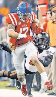  ?? AP ?? RUNNING REB’: New Giants tight end Evan Engram bulls downfield for Mississipp­i during the 2016 Sugar Bowl against Oklahoma State.