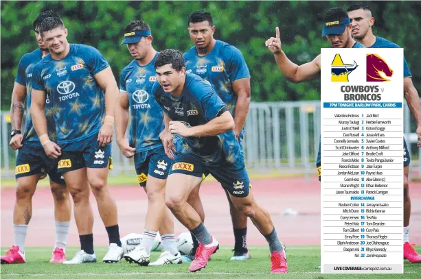  ??  ?? RACE IS ON: Jake Clifford goes for a run as his Cowboys teammates watch on at yesterday’s open training session at Barlow Park.
Picture: STEWAR McLEAN