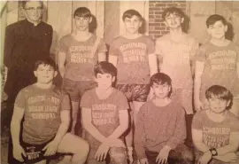  ??  ?? Fr Nick Smith and one of his early teams in Warren and right, holding a listening brief.