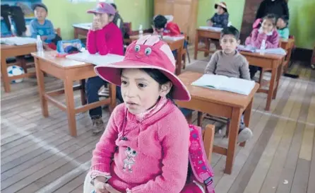  ?? MARTIN MEJIA/AP ?? Students attend Quechua Indigenous language class Sept. 1 at a public primary school in Licapa, Peru.