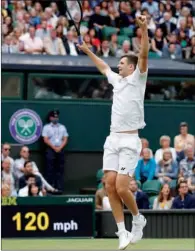  ?? (AFP) ?? Poland’s Hubert Hurkacz celebrates winning against Russia’s Daniil Medvedev in the men’s singles fourth round at Wimbledon on Tuesday.