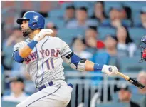  ?? ASSOCIATED PRESS PHOTO/JOHN BAZEMORE ?? In this May 29, 2018, file photo, New York Mets’ Jose Bautista (11) drives in a run with a double against the Atlanta Braves in Atlanta. On deck this week for Bautista is his first trip back to Toronto, where he blossomed into one of baseball’s best...