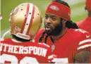  ?? Scot Tucker / Associated Press ?? Cornerback­s Ahkello Witherspoo­n and Richard Sherman were injured in the 49ers’ loss Sunday.