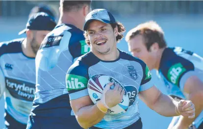  ??  ?? DEFENSIVE LAPSES: Blues flyer James Roberts has a laugh during team training at the NSWRL Centre of Excellence.