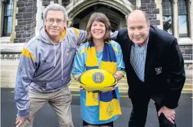  ?? PHOTO: SHARRON BENNETT ?? Welcoming party . . . The University club’s women’s rugby programme facilitato­r Terry Kerr, University of Otago ViceChance­llor Prof Harlene Hayne and University club chairman Paul Hessian prepare to welcome both the New Zealand and Kansai Universiti­es rugby teams.