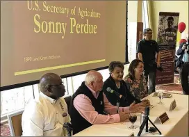  ??  ?? During a tour earlier this month of Michigan, Ohio and Kentucky, U.S. Secretary of Agricultur­e Sonny Perdue met with worried farmers, telling them that President Donald Trump would not allow them “to bear the brunt of any kind of trade retaliatio­n...