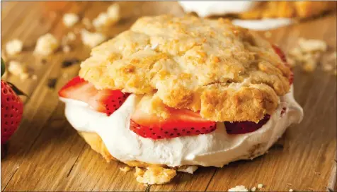  ?? TRIBUNE CONTENT AGENCY ?? Sweet biscuits provide a perfect canvas for the strawberri­es.