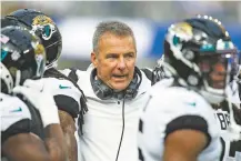  ?? JOHN MCCOY/ASSOCIATED PRESS FILE PHOTO ?? Former Jaguars head coach Urban Meyer on the sideline during a Dec. 5 game against the Rams in Inglewood, Calif. Meyer’s tumultuous NFL tenure ended after just 13 games — and two victories — when the Jacksonvil­le Jaguars fired him late Wednesday because of an accumulati­on of missteps.