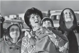  ??  ?? Above, Marilyn Lovell, with three of her children, watches from Cape Canaveral (then Cape Kennedy) as Jim Lovell launches into space on Apollo 8. Right, Jane Conrad (now Dreyfus) at age 38. Below, Jane (left) and Marilyn in 2007.