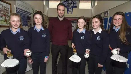  ?? Photo by John Reidy ?? KERRY HURLING GLORY IN CROKER?
Teacher Pierce Dargan (centre) with his Croke Park-bound Complete Camán team from left: Tara Enright, Joanna Moynihan, Katie Cotter, Chantelle Broderick and Fiona Brosnan.
They compete with their allin-one training...