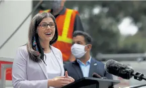  ?? David Zalubowski, The Associated Press ?? Colorado Secretary of State Jena Griswold speaks at a mobile voting location in the Swansea neighborho­od June 30 in downtown Denver.