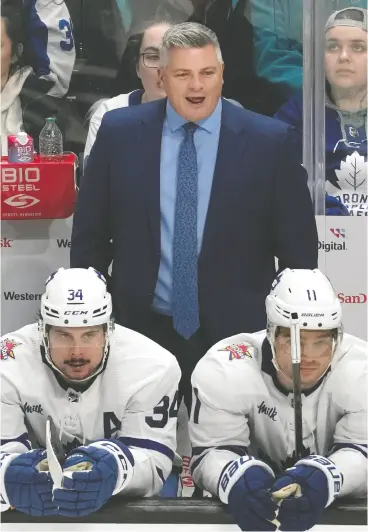  ?? JEFF CHIU / AP PHOTO FILES ?? Toronto Maple Leafs head coach Sheldon Keefe says he won’t have clarity on the status
of Bobby Mcmann and Max Domi for Game 1 of the playoffs until later in the week.