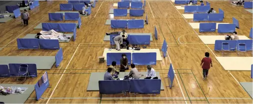  ?? The Yomiuri Shimbun ?? Residents are seen at an evacuation facility in Hitoyoshi, Kumamoto Prefecture, on July 5.