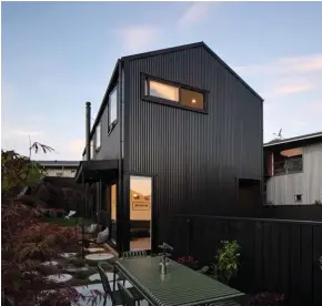  ??  ?? ABOVE LEFT Rogan Nash Architects’ project The Blackbird. The Grey Lynn, Auckland home with two living spaces and four bedrooms shows how a well-conceived floorplan can rise above the limitation­s of a compact site. ABOVE RIGHT Their City Chalet project in Auckland’s Parnell doubled the size of the house with a comprehens­ive extension that included the specificat­ion of the furniture and fittings too, among them this custom-designed library ladder. OPPOSITE Eva (left) and Kate.