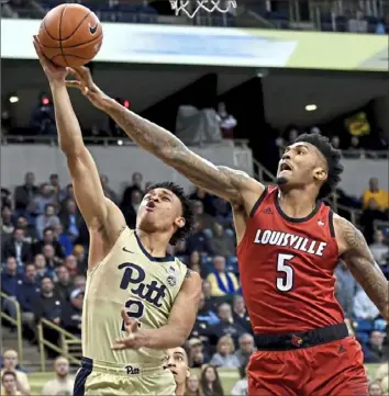  ?? Matt Freed/Post-Gazette ?? Trey McGowens had two 30-point games in less than a week after no Pitt freshman had had one in 2,772 games.