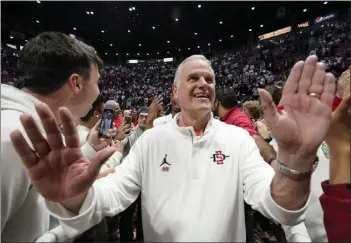  ?? GREGORY BULL – THE ASSOCIATED PRESS FILE PHOTO ?? Coach Brian Dutcher and San Diego State, which has won 12of its last 13games, take on No. 1overall seed Alabama tonight.