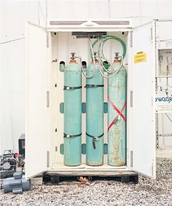  ??  ?? Three hydrogen tanks outside Mr Strizki’s workshop.