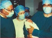  ??  ?? ABOVE: The medical team that helped bring Louise into the world. BELOW: A childhood snap with her mom, Lesley, who died in 2012.