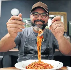  ?? Picture: Thuli Dlamini ?? Owner Marco Santonicco­lo enjoys Linguine à la Shaik, a dish named after corrupt Durban ’financial adviser’ Shabir Shaik.