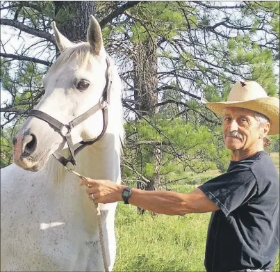  ?? SUBMITTED ?? Ron McConnell and his horse Rio are pictured in this undated photo in British Columbia. McConnell and his wife, members of the Canadian Disaster Animal Response Team (CDART), moved to P.E.I. from B.C. six months ago and plan to start up a CDART chapter...