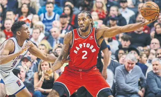  ?? RICK MADONIK TORONTO STAR ?? If his statistics over his past five games are any indication, superstar forward Kawhi Leonard is comfortabl­e with his role on the Toronto Raptors.