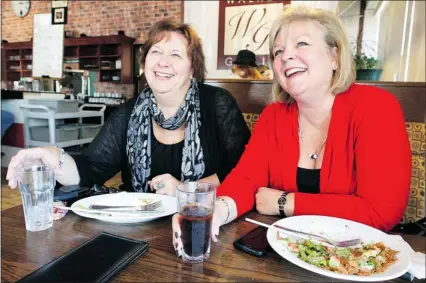  ?? NICK BRANCACCIO/The Windsor Star ?? Shelley Thrasher, left, and Karen Parr celebrate their mammogram examinatio­ns with a “mammodate” at Walker Grill on Thursday.
A recent survey for the Canadian Cancer Society suggests many women in Ontario are confused about the tests’ importance.