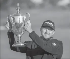  ?? STEPHEN B. MORTON, THE ASSOCIATED PRESS ?? Canada’s Mackenzie Hughes after winning the playoff round at the RSM Classic golf tournament, Nov. 21. He makes his first career appearance at the Masters next month.