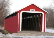  ?? ?? The Parks Department aims to paint the Ceylon Covered Bridge in the near future. Photo courtesy of the Geneva Chamber of Commerce.