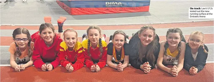  ?? ?? On track Law’s U12s tested out the new running surface at the Emirates Arena