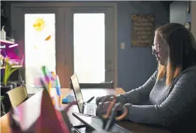  ??  ?? Kristina Mccombie, a first-grade teacher at Stevens Elementary in Wheat Ridge, has brought some of the comforts of her classroom to her Arvada home, such as a stuffed toy horse that her students pass around, to maintain some normalcy.