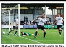  ??  ?? BRAD ALL OVER: Scorer Elliot Bradbrook salutes the fans