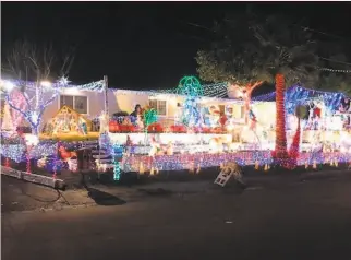  ?? Scott Doyal ?? Scott Doyal has made his Santa career at Vallejo’s Christmas Lights House, which is dimmed this pandemic year. He’ll do some spot Santa work this year.