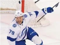  ?? REINHOLD MATAY/ASSOCIATED PRESS ?? Tampa Bay center Ross Colton celebrates scoring against the host Florida Panthers at 19:56 of the third period, giving the Lightning a 2-1 win Thursday night and a 2-0 series advantage.