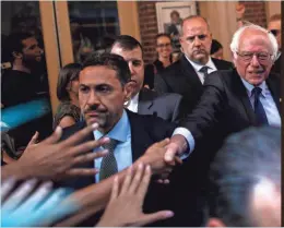  ?? KENA BETANCUR, AFP/GETTY IMAGES ?? Bernie Sanders greets supporters in New York last month. He also “endorsed” a USA TODAY reporter.