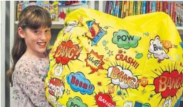  ??  ?? Caitlyn Eadie with her comic-themed beanbag.