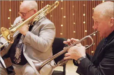  ?? Toni Dolce / Contribute­d photo ?? Richard Clark, left, who plays trombone in the Stamford Symphony Brass Quintet, with quintet member Timothy Schadt, on trumpet. The Stamford Symphony Brass Quintet is celebratin­g the new year with an afternoon of music in a free interactiv­e event which takes place on the symphony’s website Jan. 3, at 3 p.m. Quintet also includes Don Batchelder (trumpet), Eva Conti (horn), and Brian Brown (tuba).