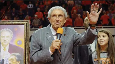  ?? Associated Press ?? Legendary coach: Eddie Sutton, head coach at Oklahoma State between 1990-2006, is honored at halftime of the Oklahoma State basketball game against Iowa State in Stillwater, Okla. Sutton, the Hall of Fame basketball coach who led three teams to the Final Four and was the first coach to take four schools to the NCAA Tournament, died Saturday. He was 84.