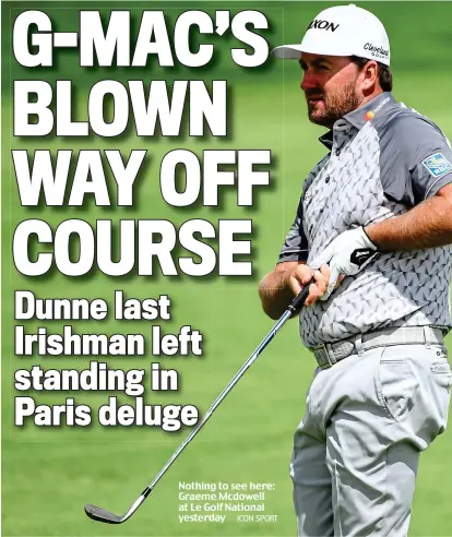  ?? ICON SPORT ?? Nothing to see here: Graeme Mcdowell at Le Golf National yesterday