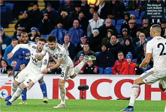  ?? HUW EVANS ?? The king of curl: Hoilett watches his shot sail in