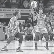  ?? DAVID KADLUBOWSK­I/AZCENTRAL SPORTS ?? Phoenix Mercury guard Danielle Robinson makes a pass against Seattle Storm guard Jewell Loyd in the first half of their WNBA first-round playoff game Wednesday in Tempe.