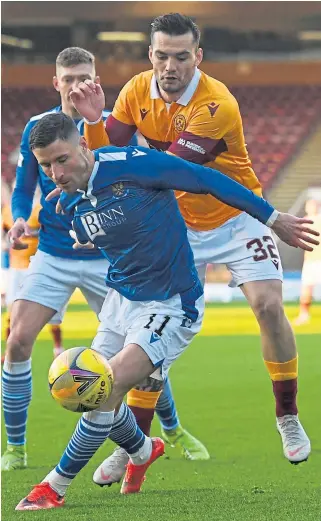  ??  ?? SUPER SAINTS: Left: Callum Hendry celebrates after levelling the scores in Saturday’s cup tie; above: Gamechange­r Michael O’Halloran holds off Motherwell’s Tony Watt.