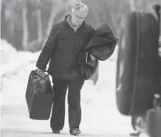  ??  ?? Judge Janet McIvor enters the La Loche courthouse on Friday morning.