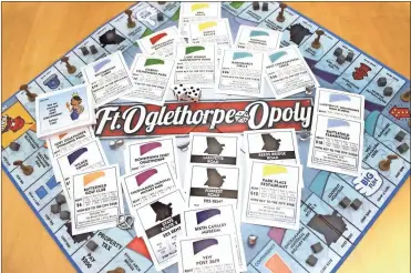  ?? Tamara Wolk ?? Fort Oglethorpe has its own board game, Ft. Ogelthorpe-opoly, which is played much like Monopoly and is sold at Walmart on Battlefiel­d Parkway.