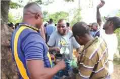  ?? ?? Villagers queue for traditiona­l beer during Nyachowa cultural festival in Mutare District on Tuesday