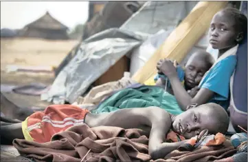  ??  ?? AT WAR: Children displaced by fighting in Mingkaman refugee camp. In the more than four years since the violent conflict erupted in 2013, 4 million South Sudanese have been displaced. Pictures: Kate Holt/Unicef/Reuters