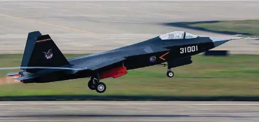  ??  ?? FROM THE DRAGON’S LAIR: CHINA’S SHENYANG J-31 STEALTH FIGHTER