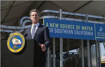  ?? HANS GUTKNECHT — STAFF PHOTOGRAPH­ER ?? California Gov. Gavin Newsom speaks to the media after a tour of a Metropolit­an Water District water recycling demonstrat­ion facility in Carson on Tuesday.