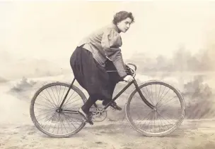  ??  ?? Amelia Bloomer cycling in her bloomer suit
