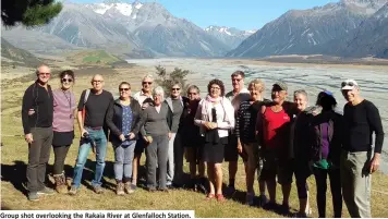  ??  ?? Group shot overlookin­g the Rakaia River at Glenfalloc­h Station.